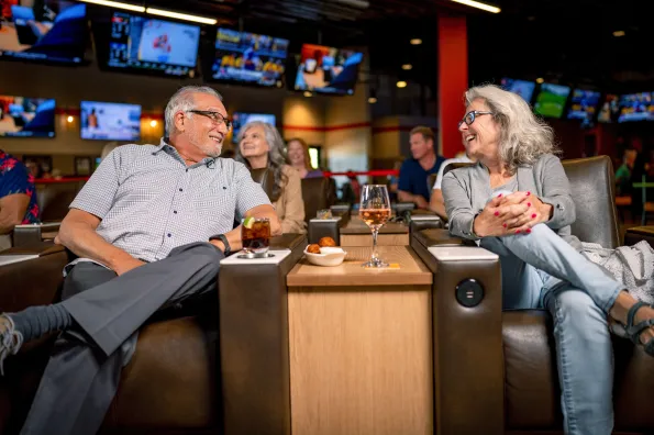 Couple enjoying the Sportsbook at Little River Casino Resort