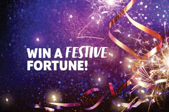 win a festive fortune promo image on purple background