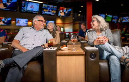 Couple enjoying the Sportsbook at Little River Casino Resort