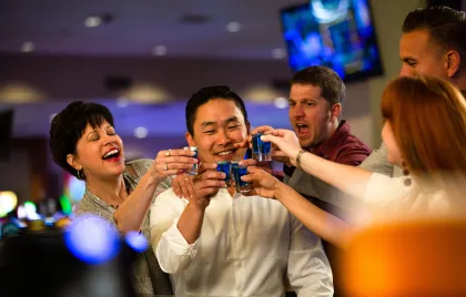 Group toasting at The Bar in Little River Casino Resort