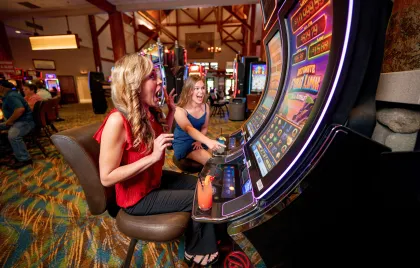 People playing slot machines in Little River Casino Resort